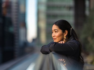 A portrait of a beautiful businesswoman in the city.
